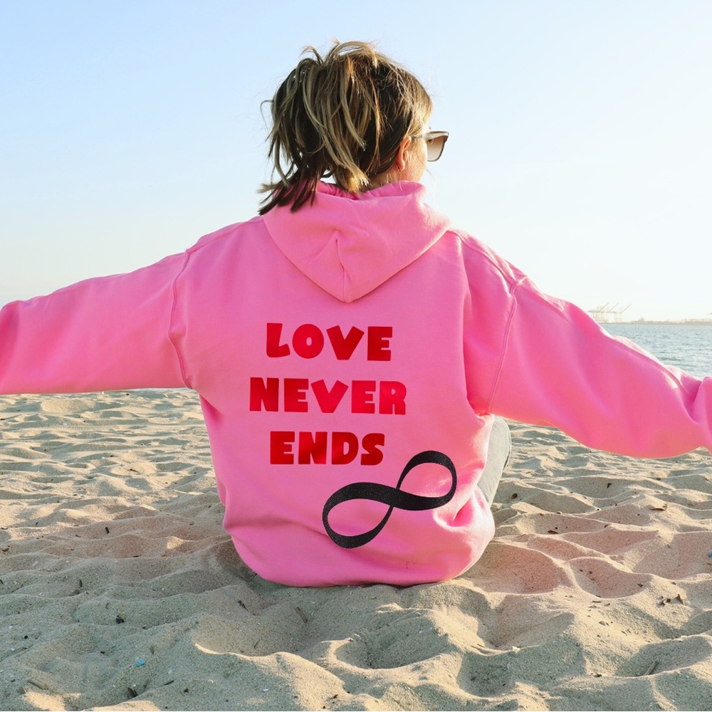 Endless Love Hoodie – Pink Pullover with “Love Never Ends” & Glitter Infinity Sy